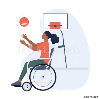 Joyful disabled woman in wheelchair playing basketball