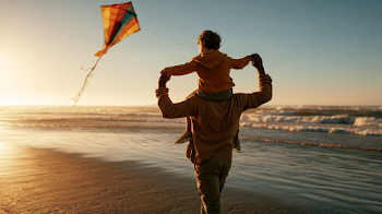 Joyful Father and Son Beach Adventure at Golden Hour