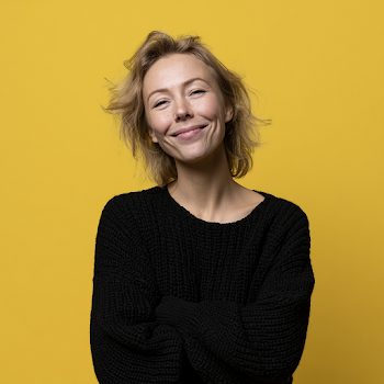 Joyful Scandinavian Professional Woman in Modern Studio