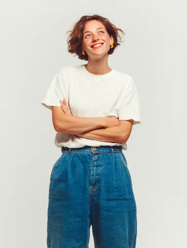 Joyful Young Woman in Casual Attire Joyful Young Woman in Casual Attire