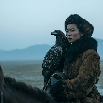 Kazakh Huntress with Golden Eagle on Horseback