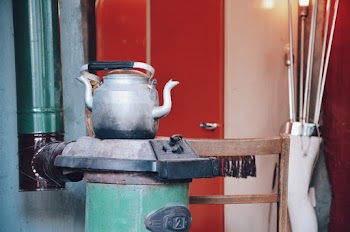 kettle on a stove  