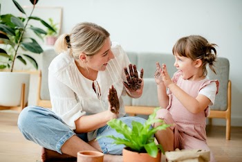 Kid DIY plant potting with mom at home | Free stock photo | High Resolution image