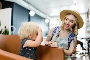 Kid getting a haircut  | Free stock photo | High Resolution image