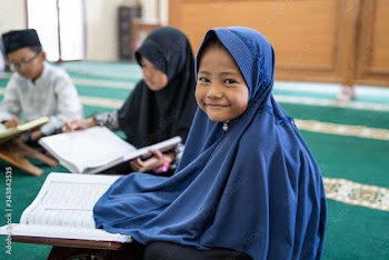 kid learning to read quran with muslim teacher or ustad