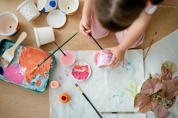 Kid painting plant pot DIY hobby | Free stock photo | High Resolution image