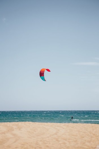 Kite Surfing At Beach