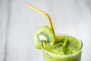 Kiwi Juice Fruit on White Surface