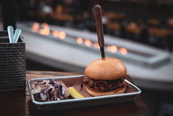 Knife Sticking On Burger On Tray