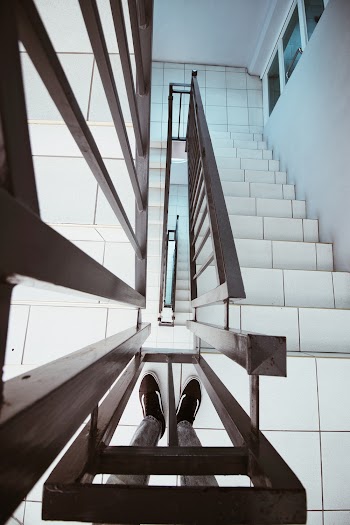 Ladder Balustrade On The Concrete Stairway