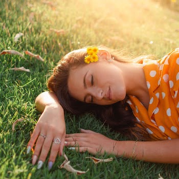 Lady Laying in the Grass