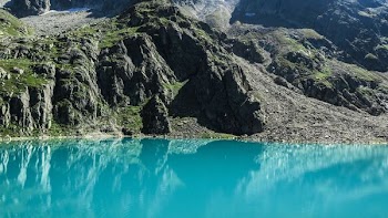 lake along body of mountain