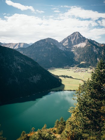 Lake Near Trees and Mountains