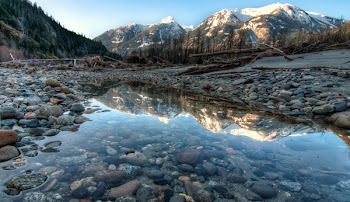Lake Pebbles Under Body of Water