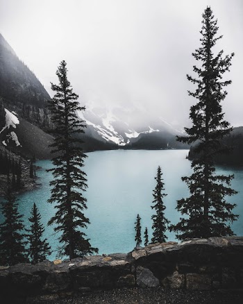 Lake Surrounded by Mountain Taken