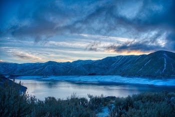 Lake Surrounded With Mountain