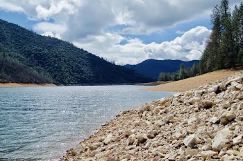 Lake Water Under Cloudy Sunny Sky