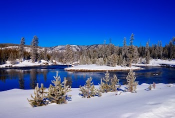 Land Covered With Snow Near Lake