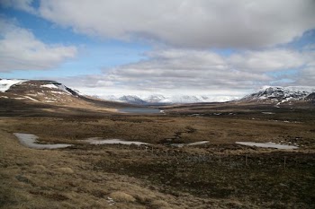 land within mountain range during daytime