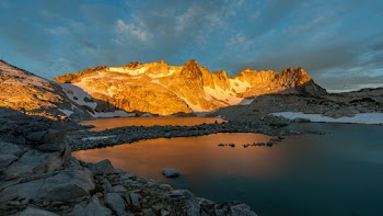 Landscape Photo of a Lake Among Mountains