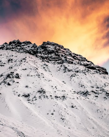 Landscape photo of a mountain covered in snow