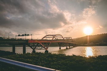 Landscape Photo of Bridge Near Body of Water