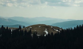 landscape photo of brown mountain