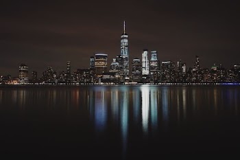 landscape photo of city building during night