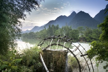Landscape Photo of Mountains Near Body of Water