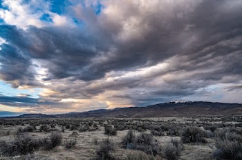 Landscape Photo of Mountains Under Cloudysky