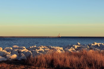 landscape photo of rocks near body of water