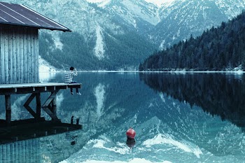 Landscape Photograph of Mountains, Trees, and Body of Water