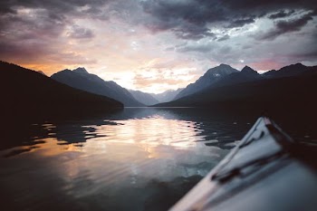 landscape photography of body of water and mountains