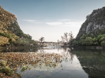 Landscape Photography of Body of Water Between Mountains