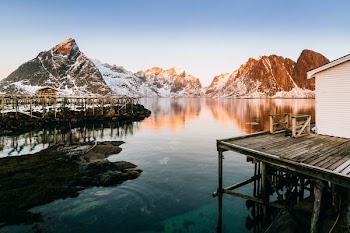 landscape photography of body of water in front of mountain