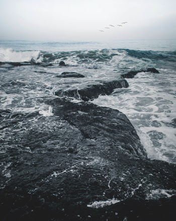 Landscape Photography of Body of Water Smashing in the Rocks