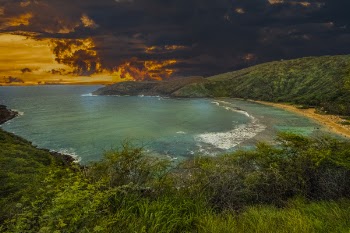 Landscape Photography of Body of Water Under Gray and Orange Sky