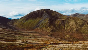 Landscape Photography of Brown and Green Mountains