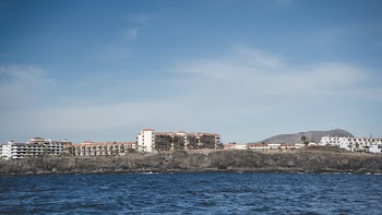 Landscape Photography of Buildings Near Body of Water