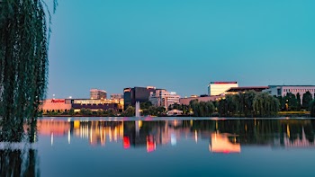 Landscape Photography of City Buildings Beside Body of Water
