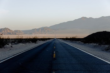 Landscape Photography of Gray Asphalted Road and Mountain Views
