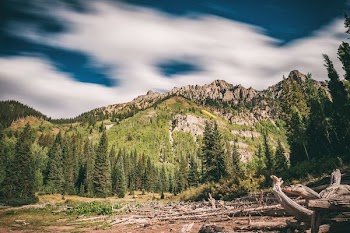 landscape photography of green mountain under clear sky