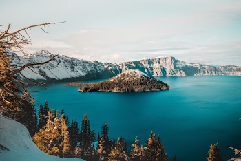 landscape photography of island in lake