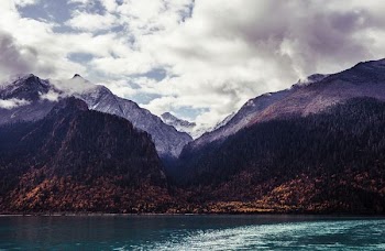 landscape photography of lake and mountains