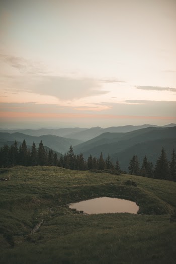 Landscape Photography of Mountains Under Sky