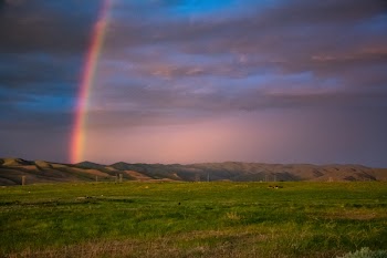 Landscape Photography of Mountains With Rainbow