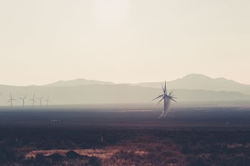 landscape photography of wind mills