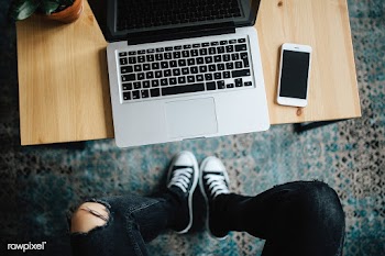 Laptop on a table. Visit <a href="https://kaboompics.com/" target="_blank">Kaboompics</a> for more free images.