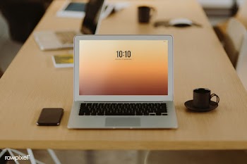 Laptop on a wooden office table | Free stock psd mockup - 488444