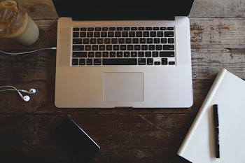          Laptop on Wooden Desk Free Photo     